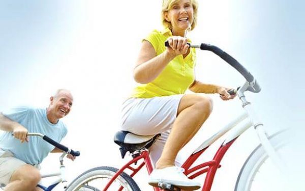 Happy Couple Riding Bicycles